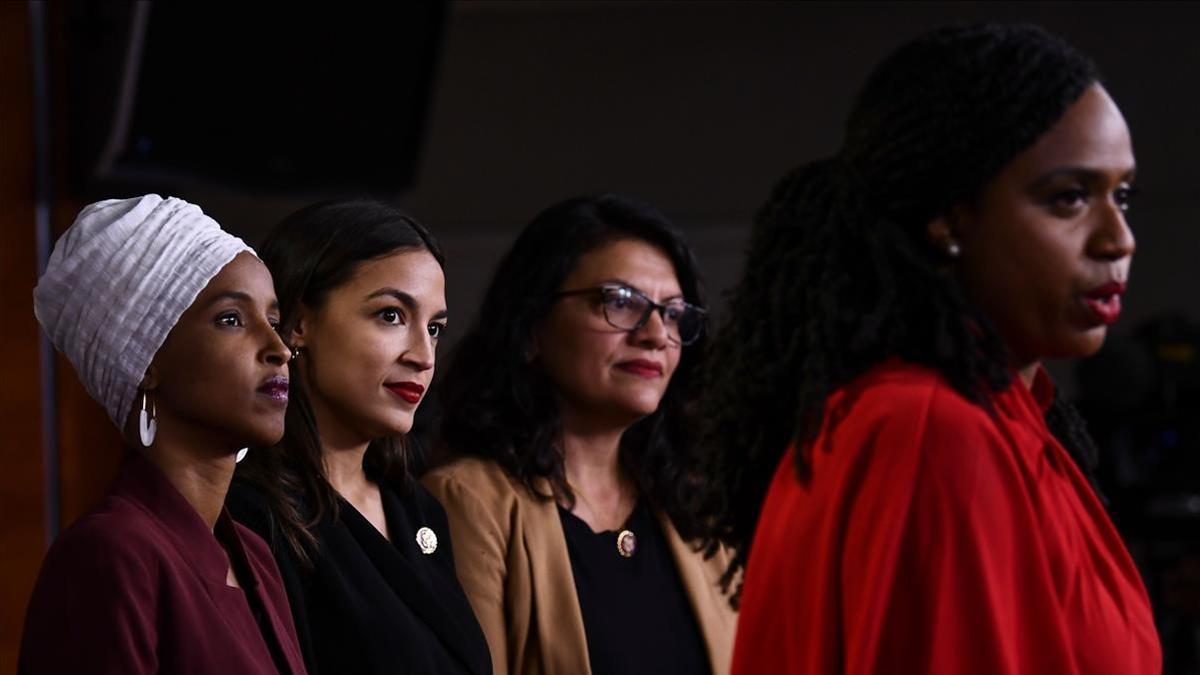 (FILES) In this file photo taken on July 15  2019 US Representatives Ayanna Pressley (D-MA) speaks as  Ilhan Abdullahi Omar (D-MN)(L)  Rashida Tlaib (D-MI) (2R)  and Alexandria Ocasio-Cortez (D-NY) hold a press conference  to address remarks made by US President Donald Trump earlier in the day  at the US Capitol in Washington  DC  - New York progressive Alexandria Ocasio-Cortez comfortably secured a second term in Congress on November 3  2020 with an expected win over her Republican challenger who was outspent despite raising  10 million  Ocasio-Cortez is part of a quartet of like-minded congresswoman known as  The Squad  who are admired on the Left for challenging the Washington status quo and her three allies appeared set to duplicate her achievement  US media called races for Minnesota s Ilhan Omar and Ayanna Pressley of Massachusetts  with Michigan s Rashida Tlaib also beating her Republican opponent by a wide margin  (Photo by Brendan Smialowski   AFP)