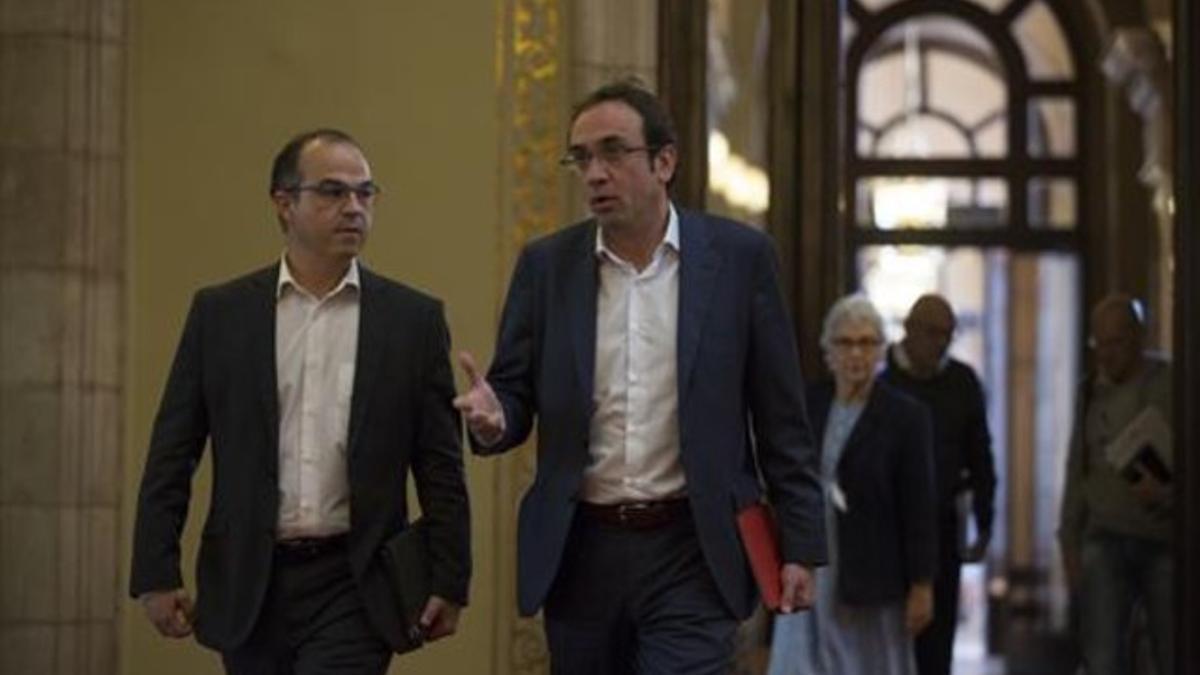 Jordi Turull y Josep Rull, de CDC, en el Parlament.