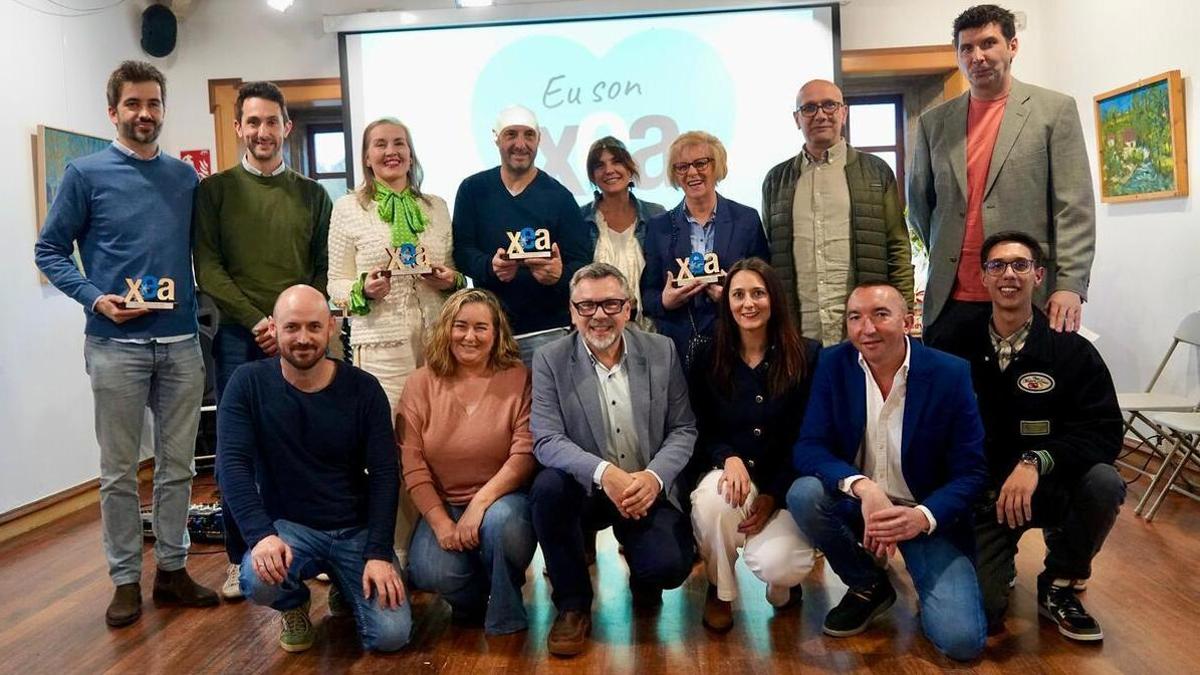 Autoridades, socios y comerciantes galardonados con los premios XEA