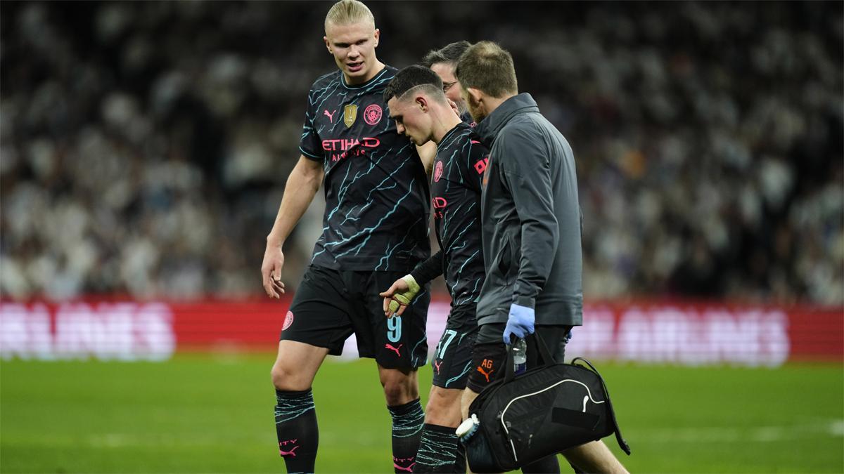 Foden junto a Haaland cuando fue sustituido en el Madrid - Manchester City