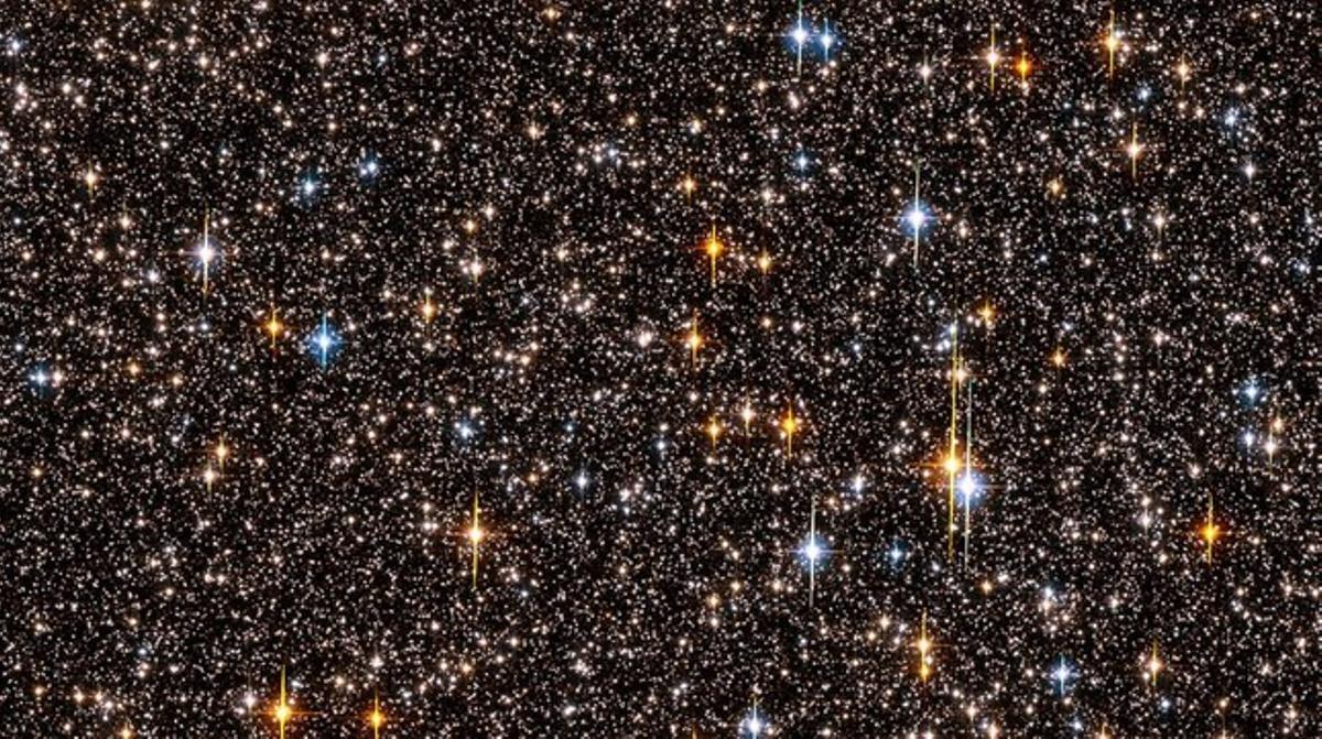 Concurrido campo estelar en el centro de nuestra galaxia, la Vía Láctea. Imagen obtenida durante una exposición de una semana en el 2006, en la que se detectaron nada menos que 180.000 estrellas.