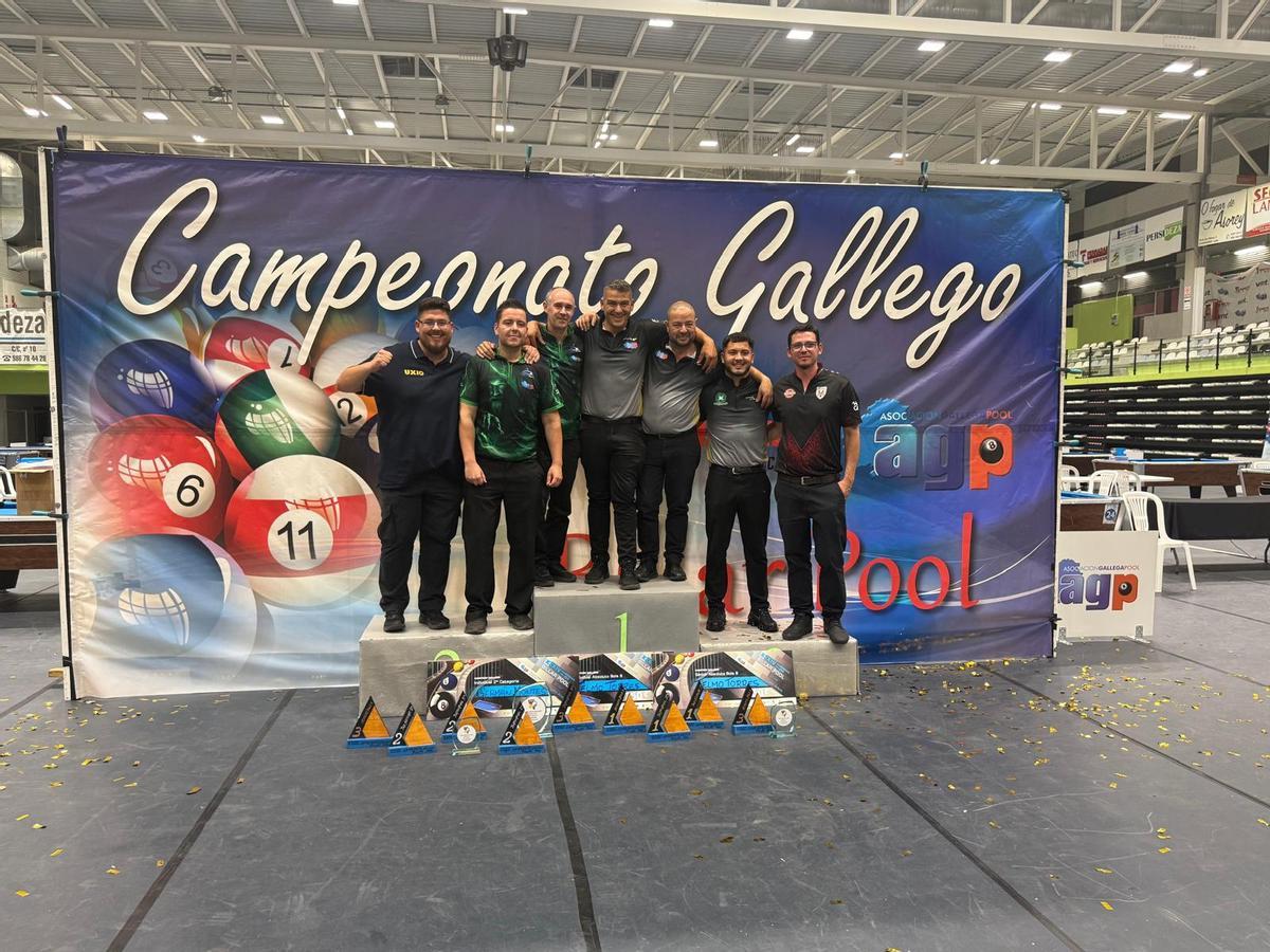 Los cangueses, en el podio.