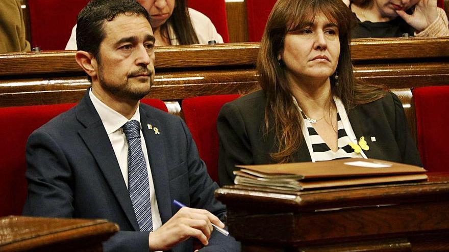 Damià Calvet i Laura Borràs, en un ple del Parlament en una imatge del 2019.