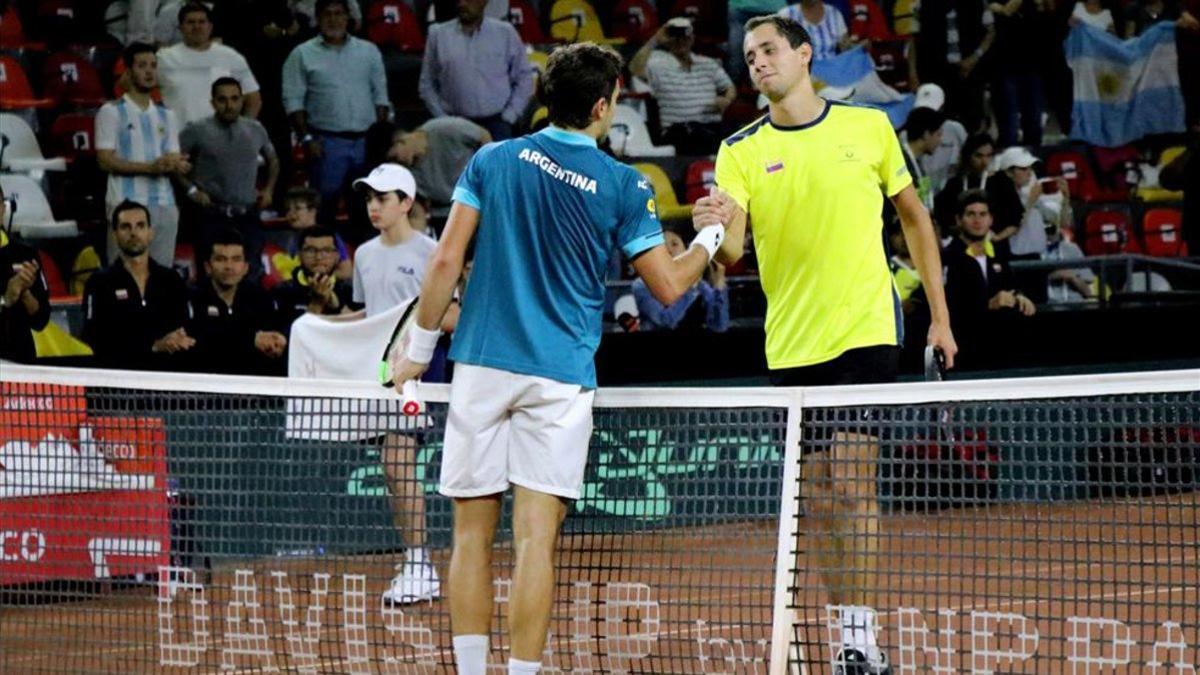 Guido Pella y Daniel Galán en un partido por la serie de la Copa Davis