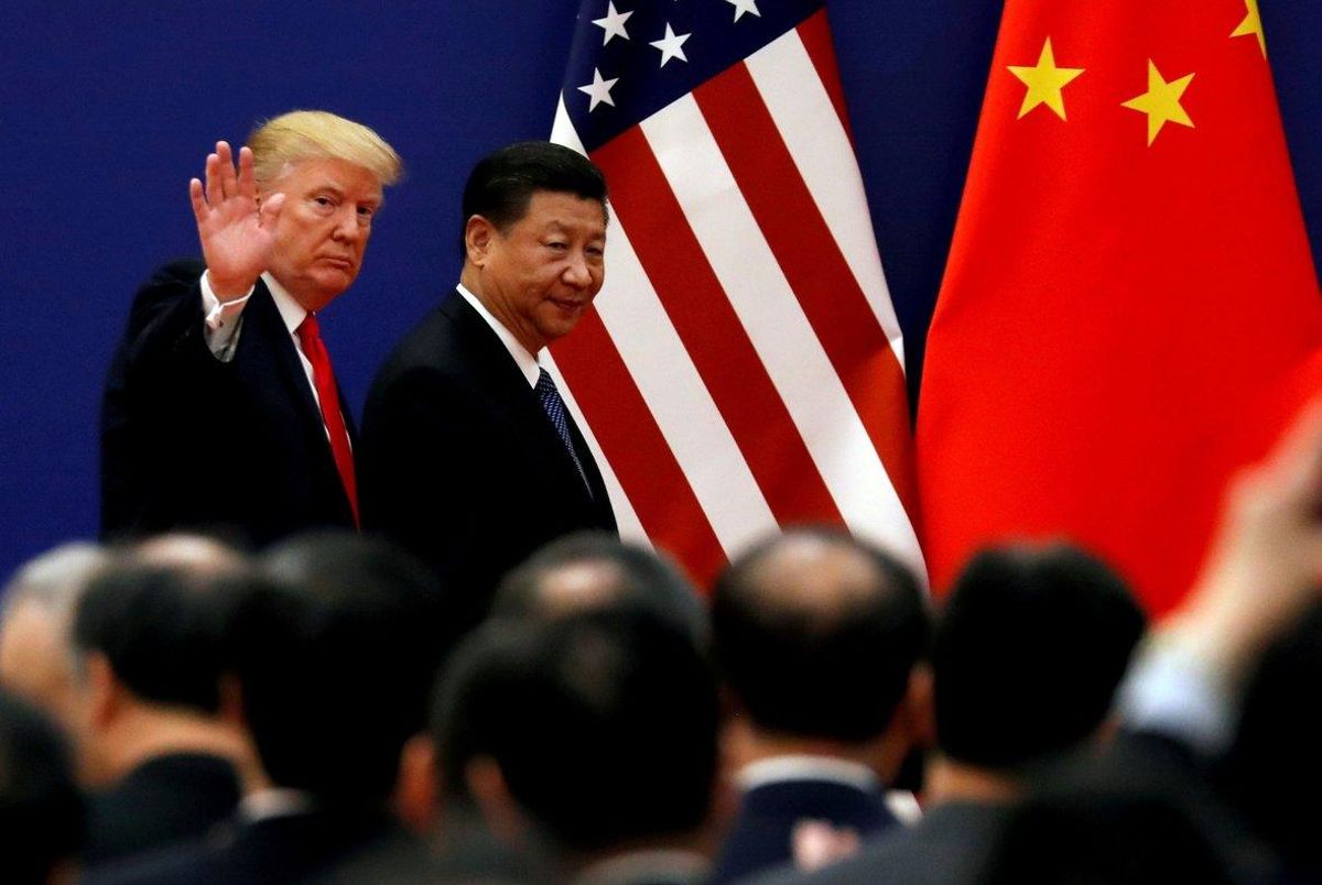 FILE PHOTO  U S  President Donald Trump and China s President Xi Jinping meet business leaders at the Great Hall of the People in Beijing  China  November 9  2017  REUTERS Damir Sagolj File Photo