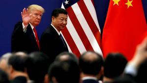 FILE PHOTO  U S  President Donald Trump and China s President Xi Jinping meet business leaders at the Great Hall of the People in Beijing  China  November 9  2017  REUTERS Damir Sagolj File Photo