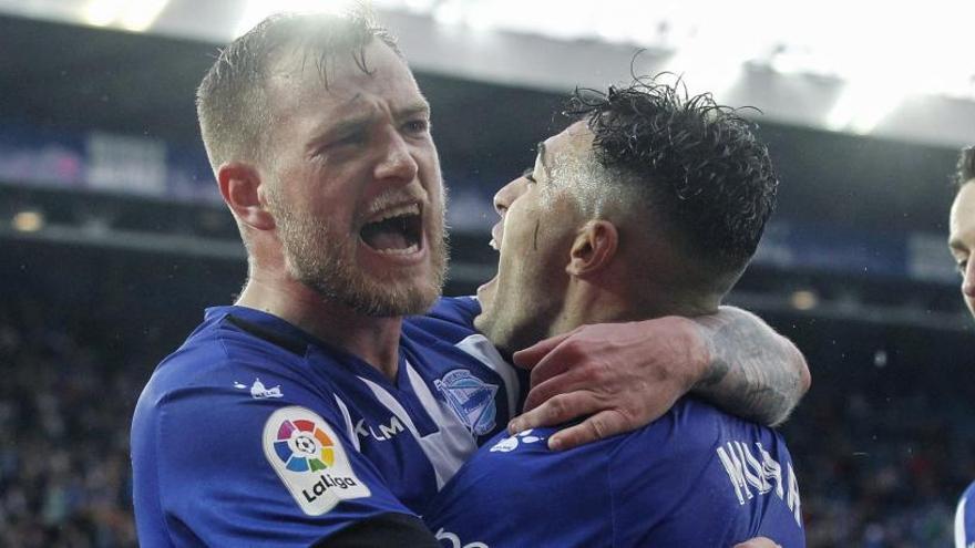 Munir El Haddadi y John Guidetti celebran uno de los goles del partido