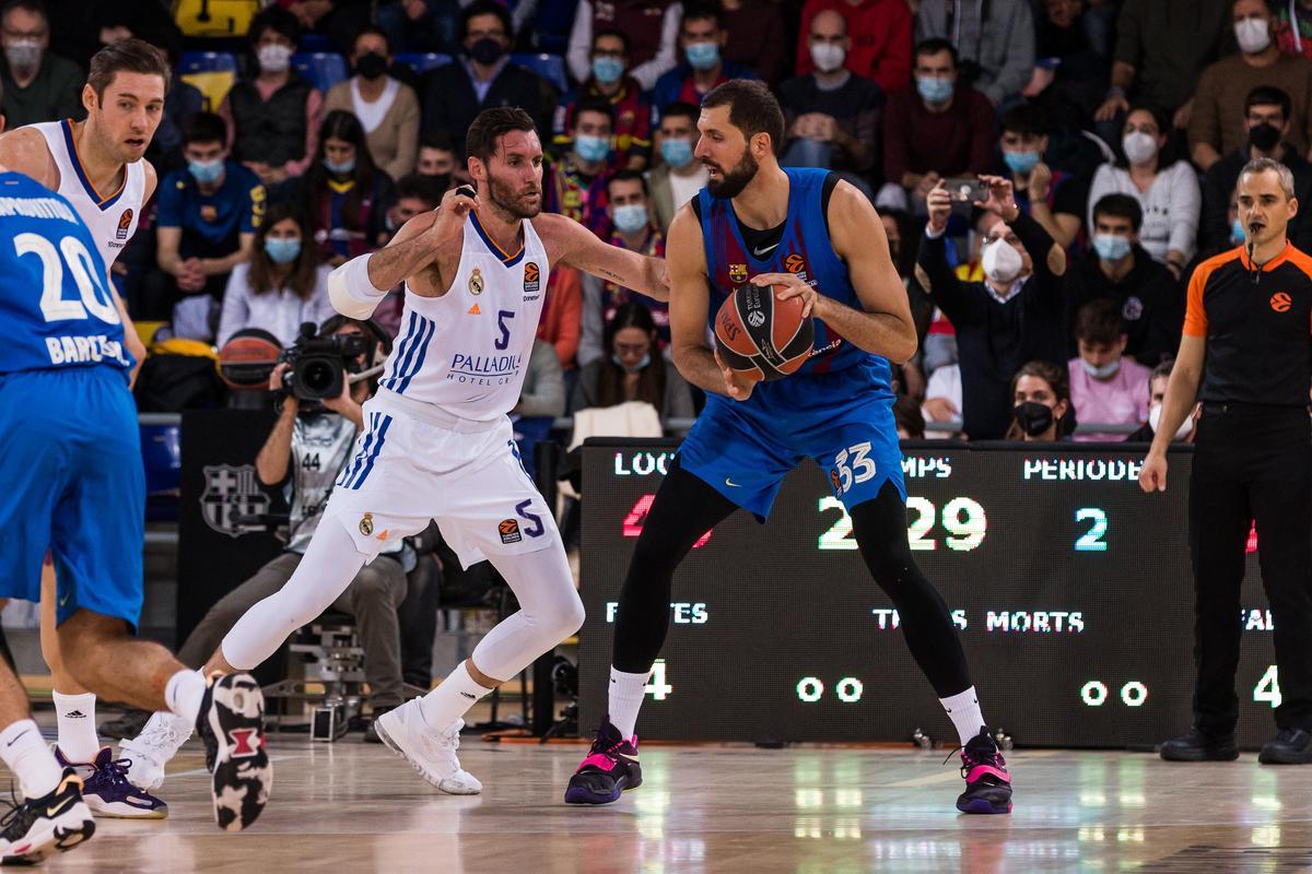 Nikola Mirotic y Rudy Fernández.