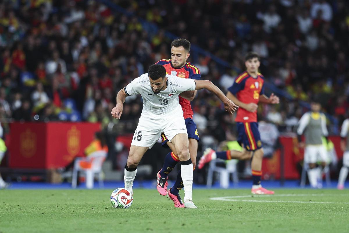 Hussein durante el partido ante España