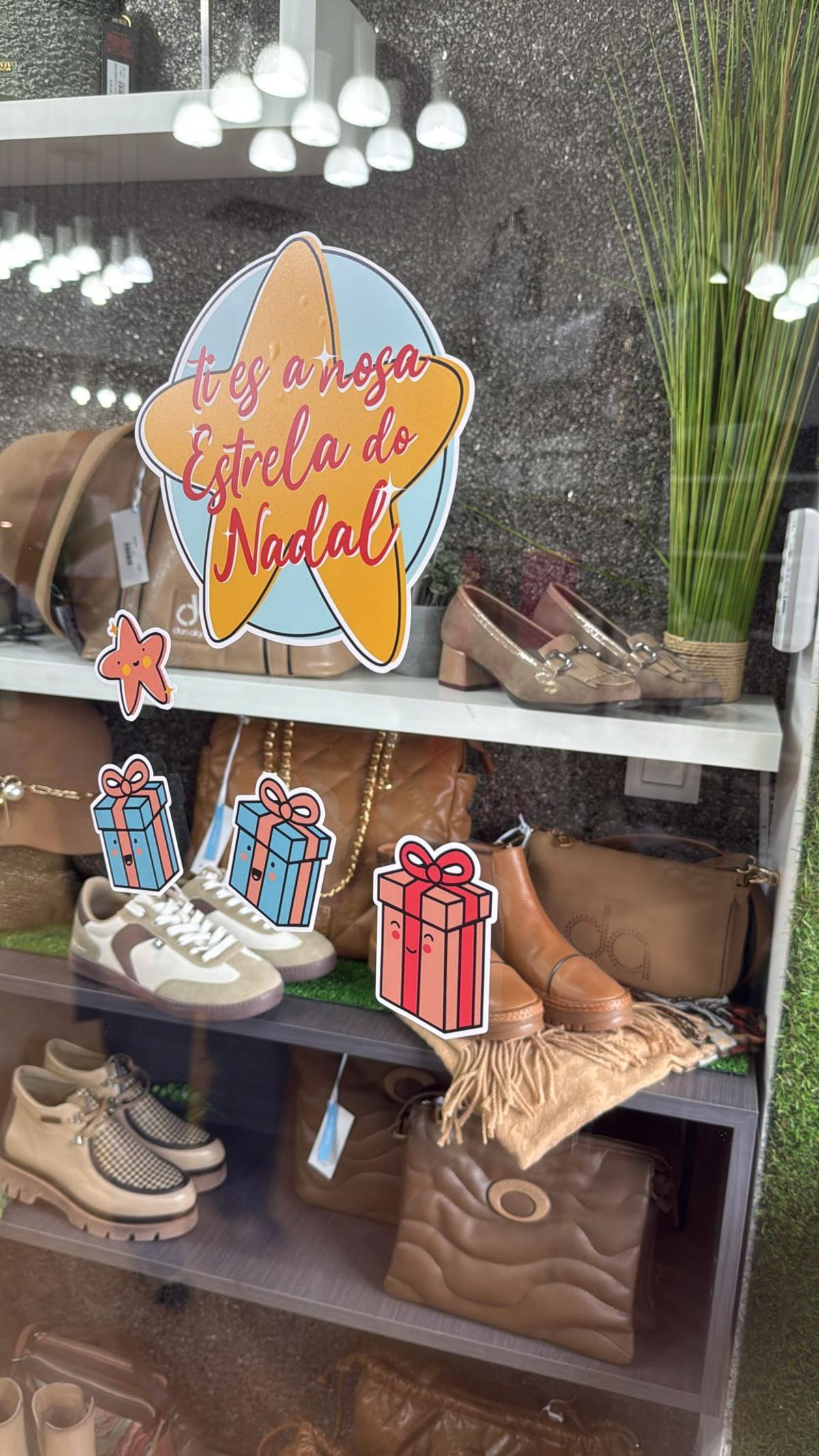 Cartelería de FECIMO nun dos establecementos.