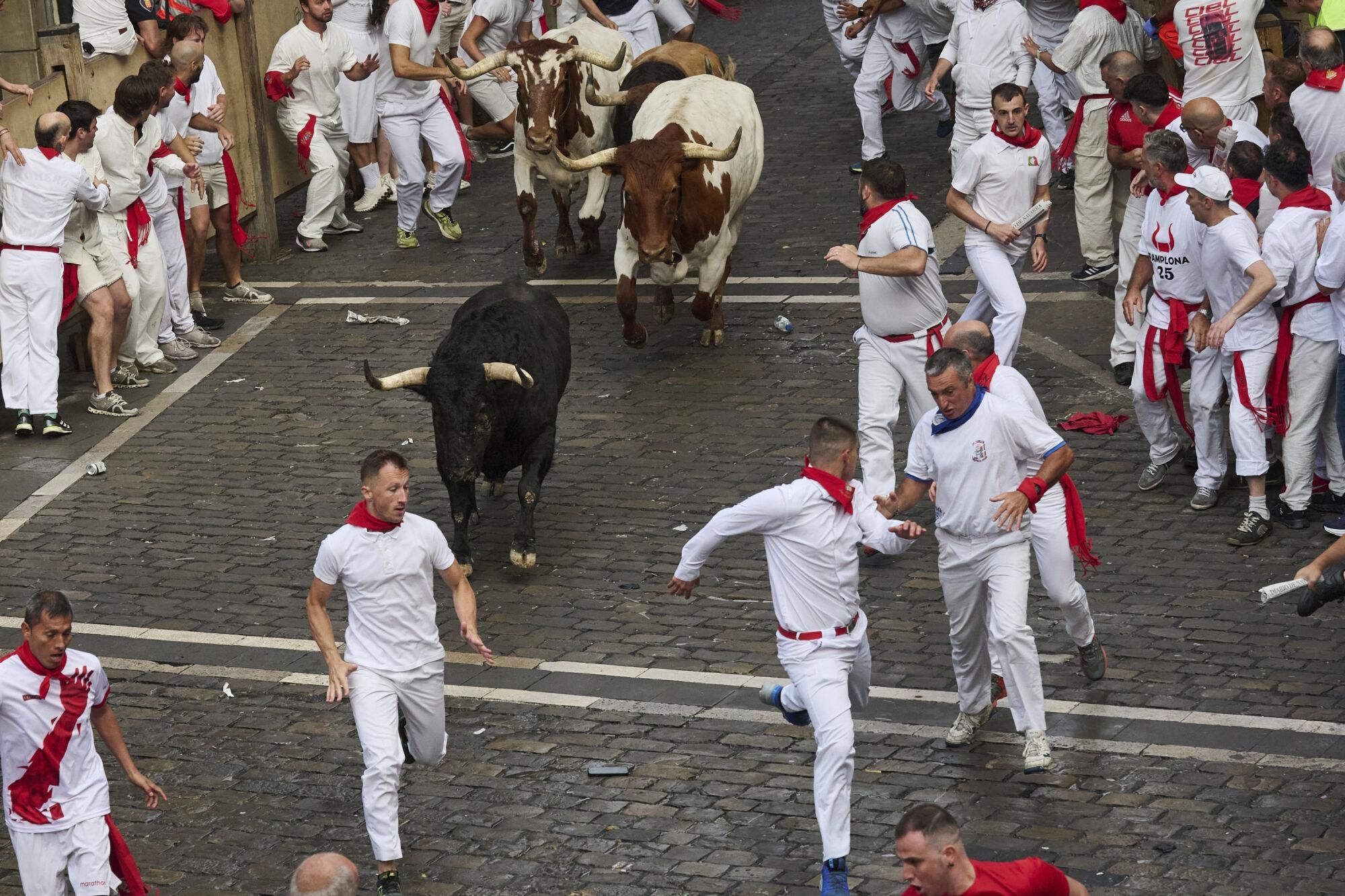 El primer encierro de los Sanfermines 2025, en imágenes.