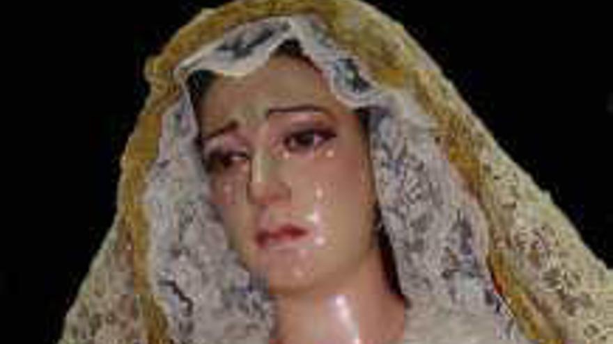 La imagen de María Santísima del Amor se traslada a la Basílica tras su restauración