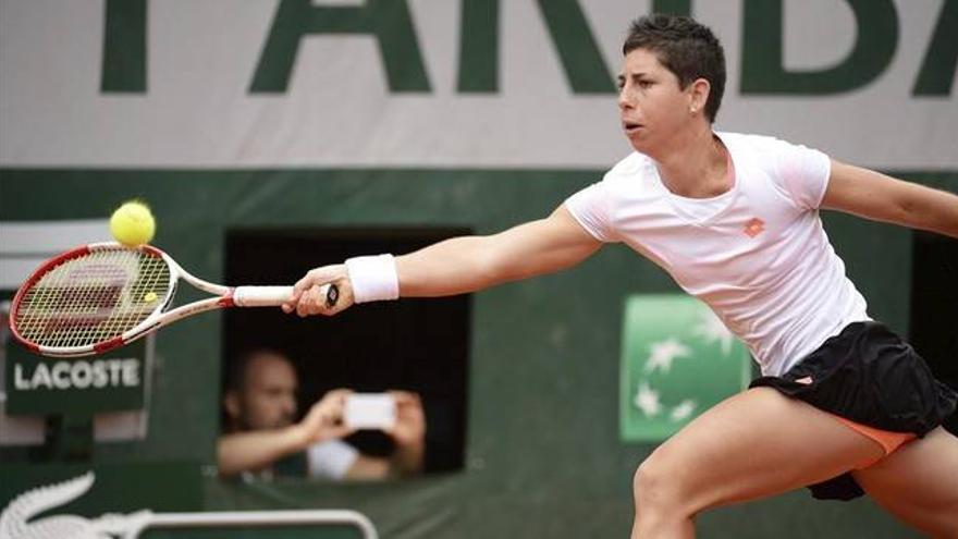 Carla Suárez y Muguruza se cuelan en octavos