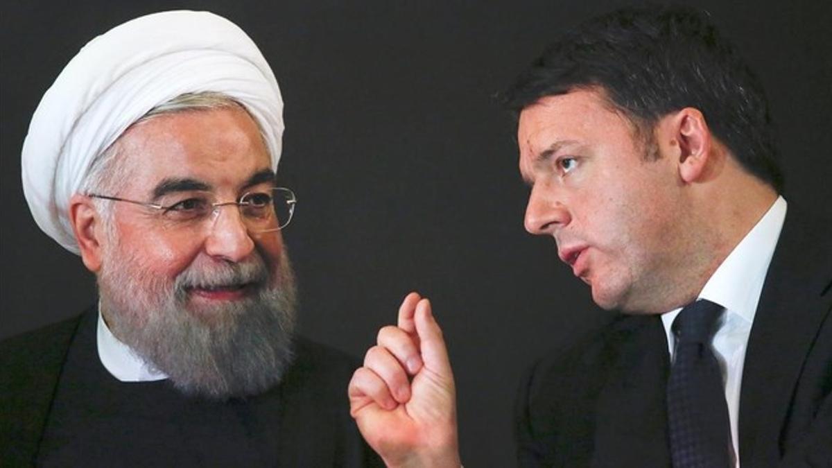 El presidente iraní, Hasan Rohani, junto al primer ministro italiano, Matteo Renzi, el lunes, en Roma.