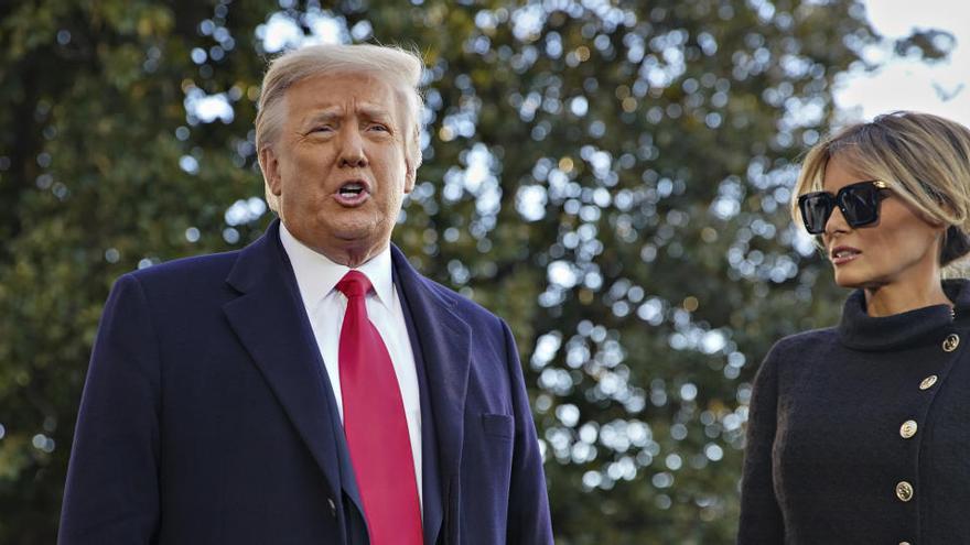 El presidente saliente de Estados Unidos, Donald Trump, junto a su esposa, Melania.