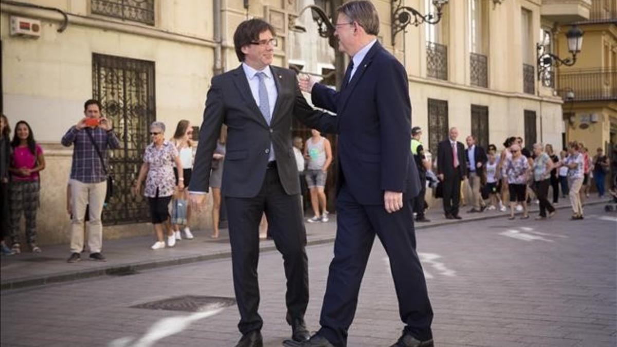 Carles Puigdemont y Ximo Puig, en València