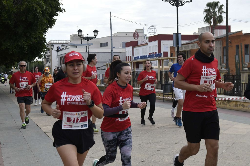 La XIII carrera solidaria Corriendo con Assido, en imágenes