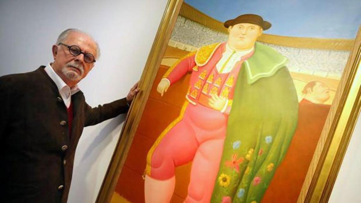 Fernando Botero, junto a uno de los cuadros de sus toreros.