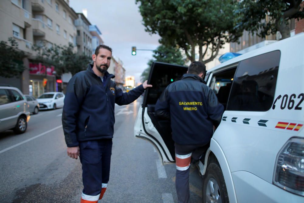 Members of the miner rescue team leave the hotel ...