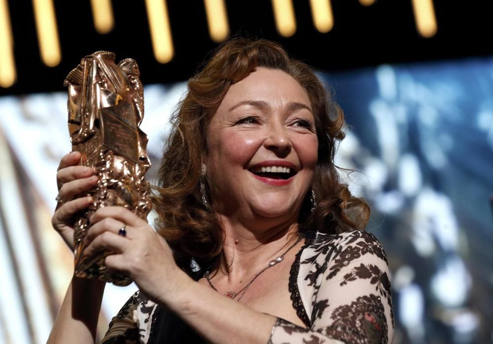 Actress Catherine Frot poses with her trophy ...