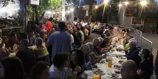 Un millar de personas se sientan a la mesa en el encuentro internacional de Rio de Onor