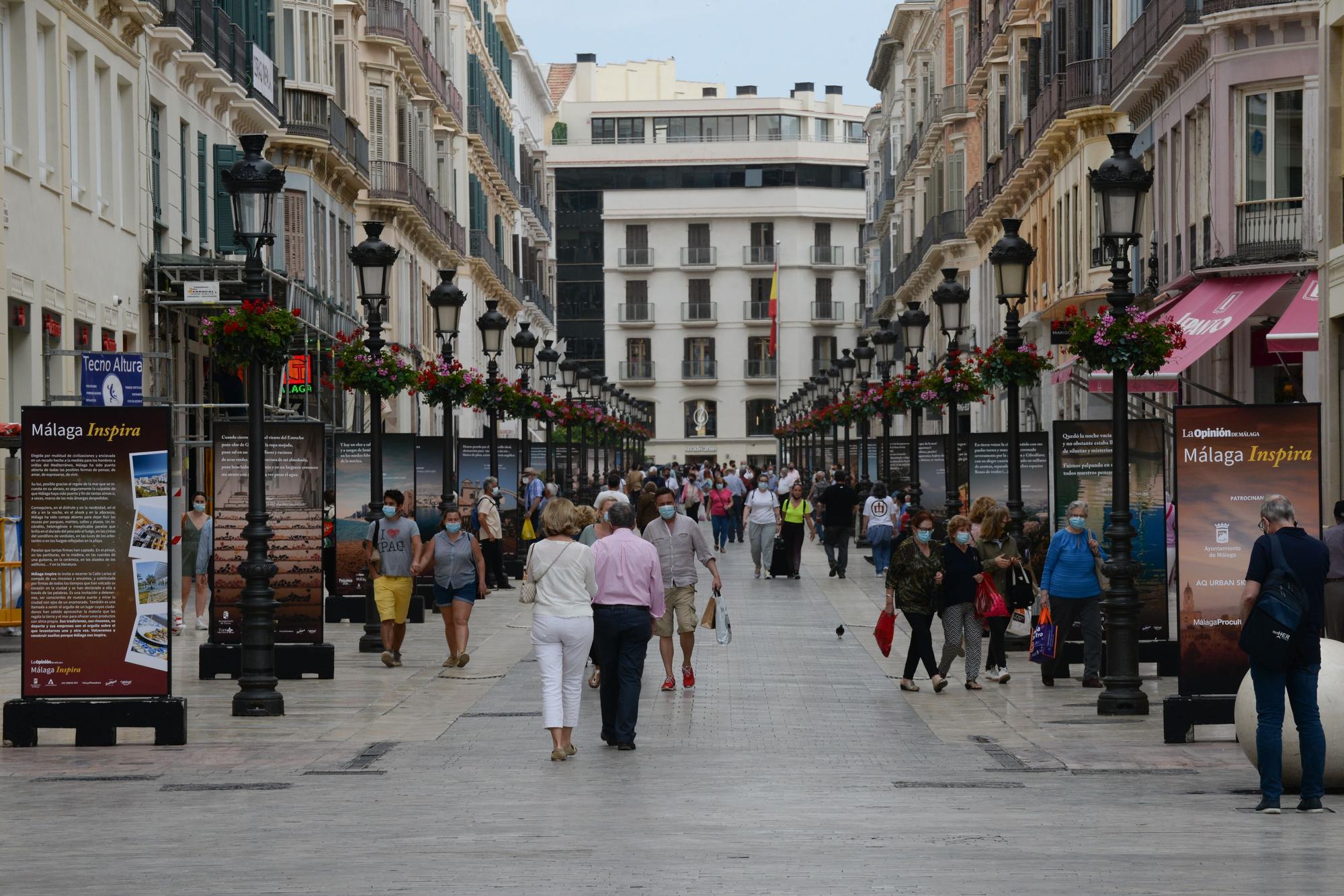 Exposición fotográfica 'Málaga Inspira', en la calle Larios