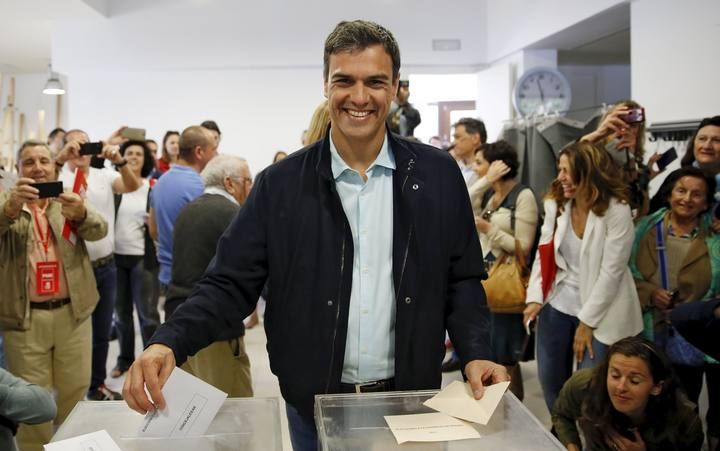 Spain's Socialist Party PSOE leader Sanchez votes at a polling station during regional and municipal elections in Pozuelo de Alarcon, outside Madrid