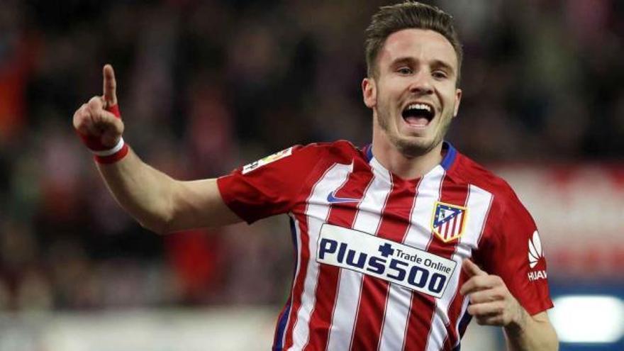 Saúl Ñíguez celebra su gol ayer en el Calderón.