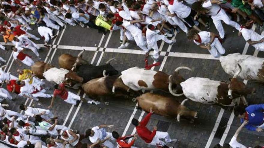 Como cada año, los mozos se enfrentan a los toros.