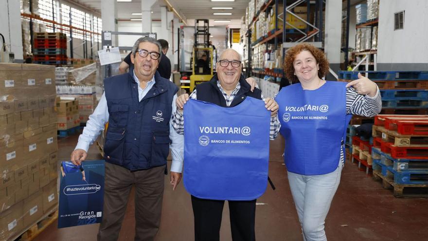 Los responsables del Banco de Alimentos, ayer, en la presentación de la Gran Recogida.   | // ALBA VILLAR