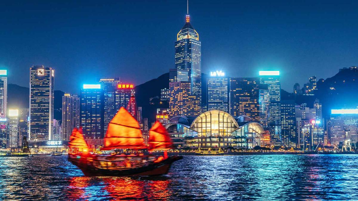 Cityscape Hong Kong and Junkboat at Twilight