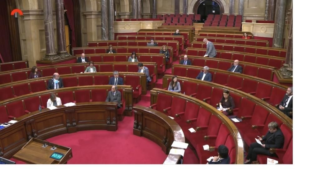 El primer ple del Parlament des del confinament, en fotos