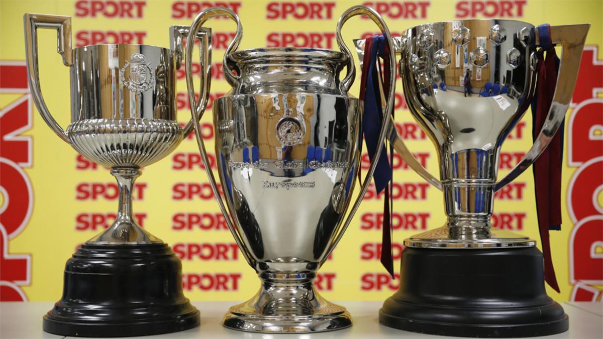 Los trofeos de la Copa del Rey, de la Champions y de la Liga española