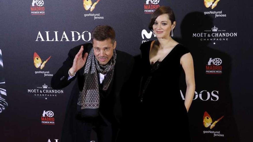 Brad Pitt y Marion Cotillard, ayer, en Madrid.