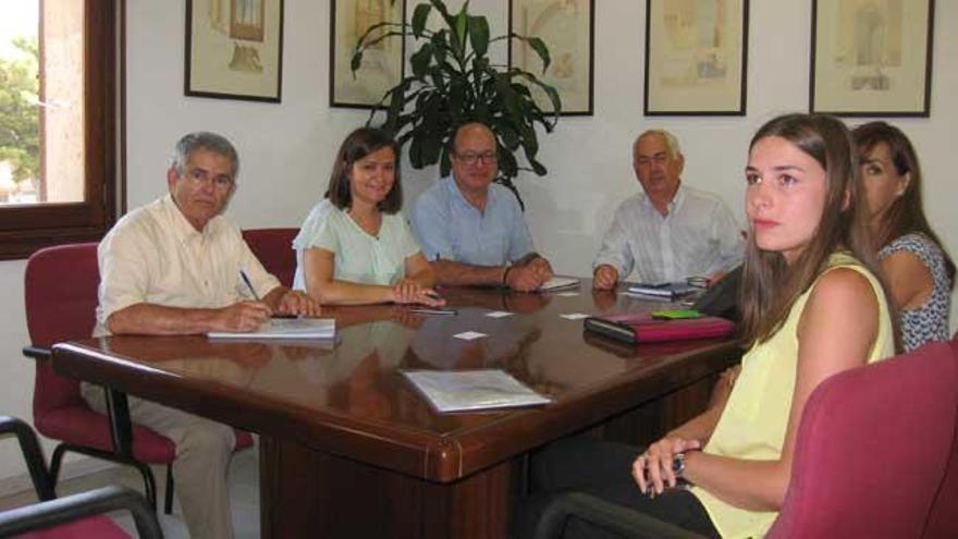 Garrido, Miranda, Colom y representantes de la concesionaria.