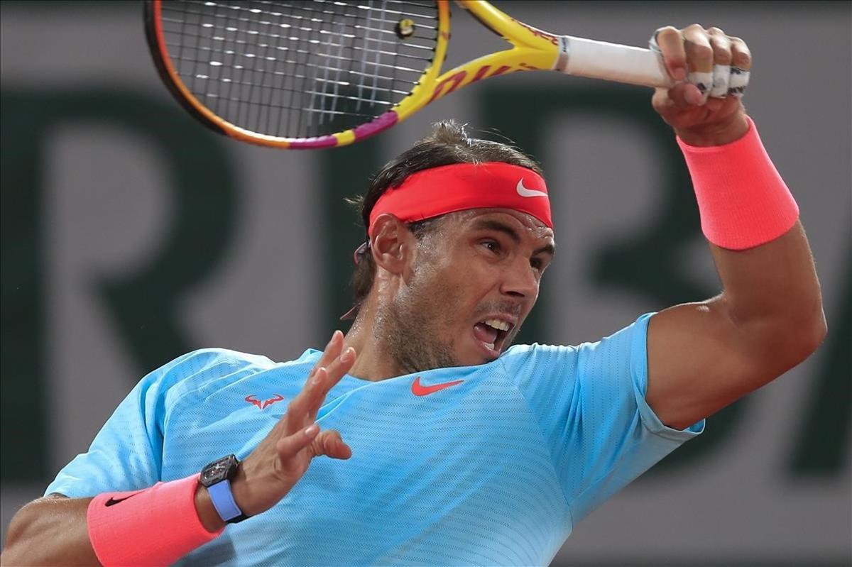 lmendiola55230247 spain s rafael nadal plays a shot against italy s stefano tr201002181054