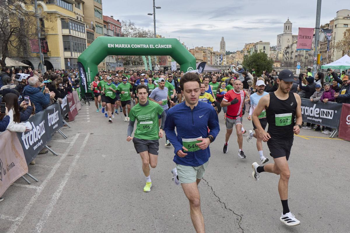 La XII Tradeinn Cursa Girona en Marxa Contra el Càncer en imatges