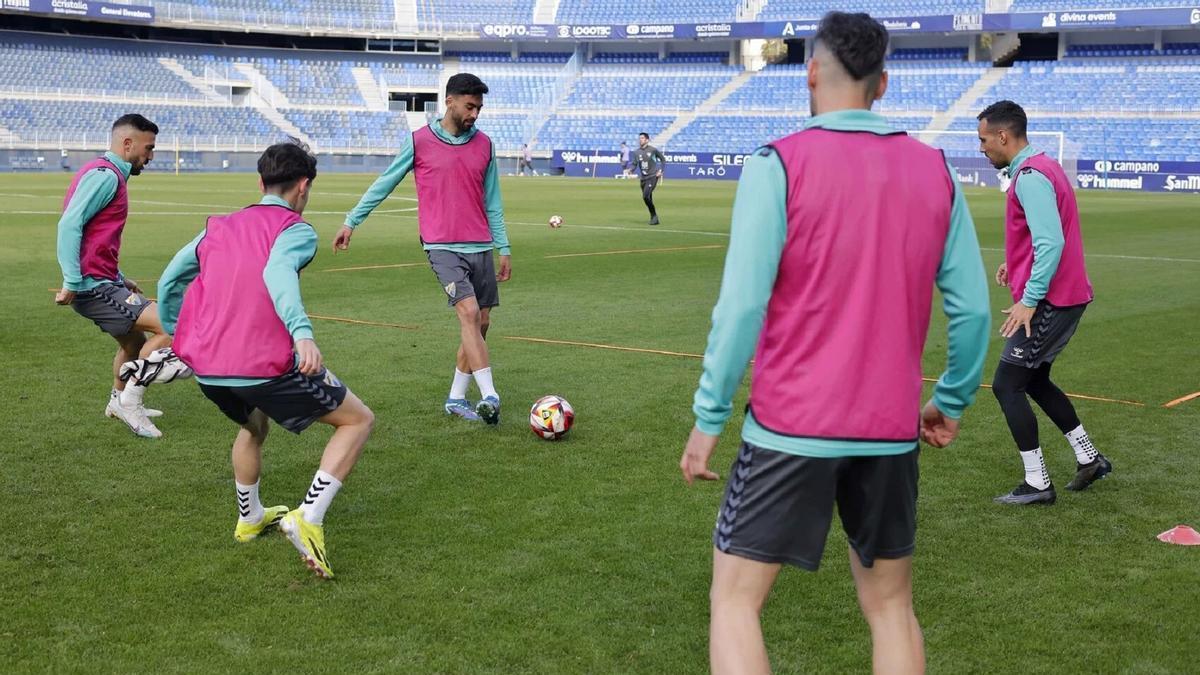 Algunos jugadores del Málaga CF, en una sesión de esta semana.