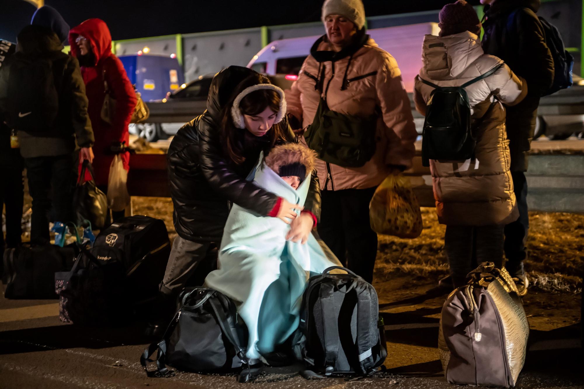 Un grupo de refugiados en la frontera de Polonia y Ucrania, a 7 de marzo de 2022.