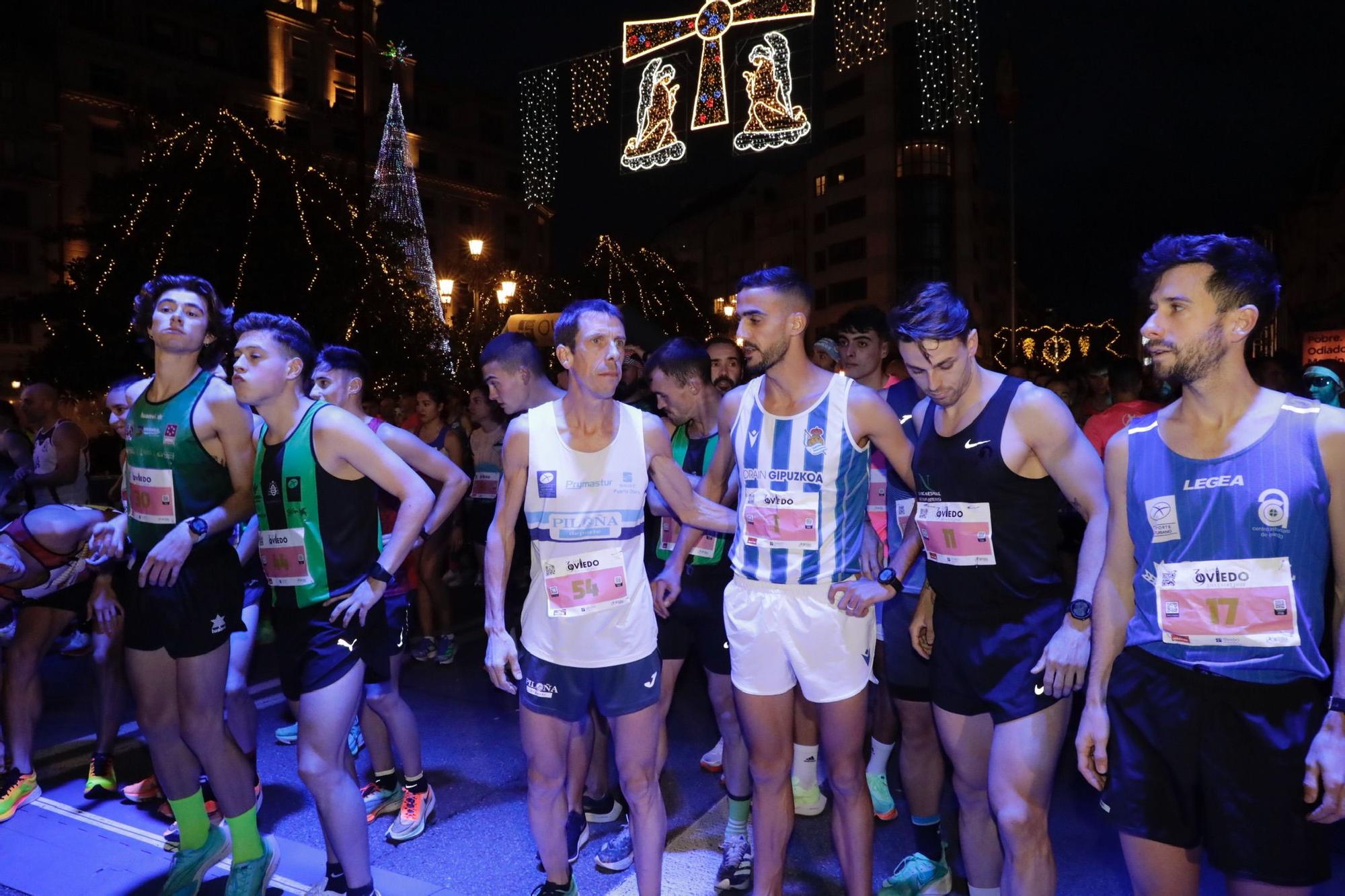 En imágenes: Jaime Bueno (Univerisad de Oviedo) y Mariam Benkert triunfan en la San Silvestre de Oviedo