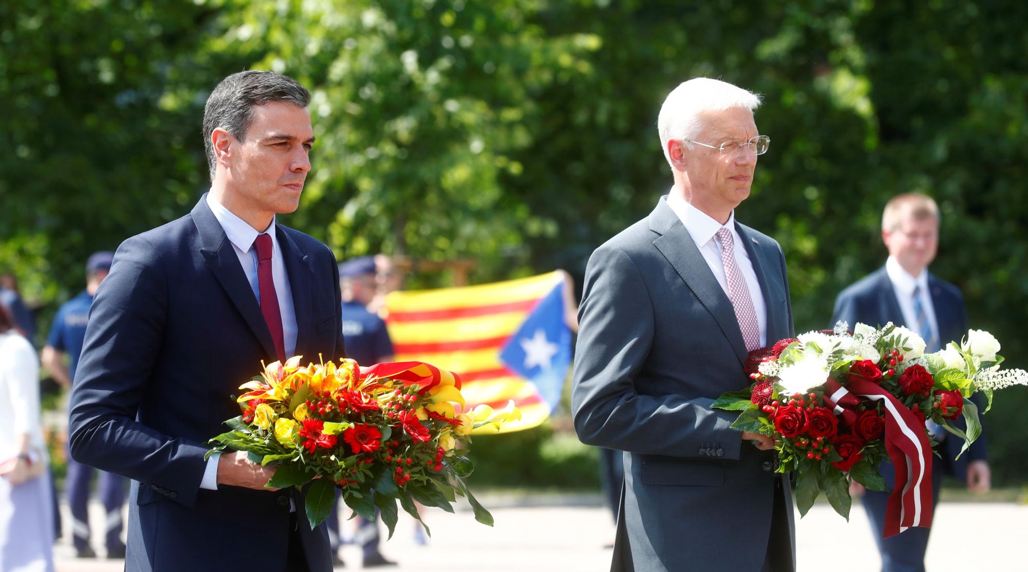 Spanish PM Sanchez and Latvian PM Karins attend flower ceremony at the Freedoms monument in Riga