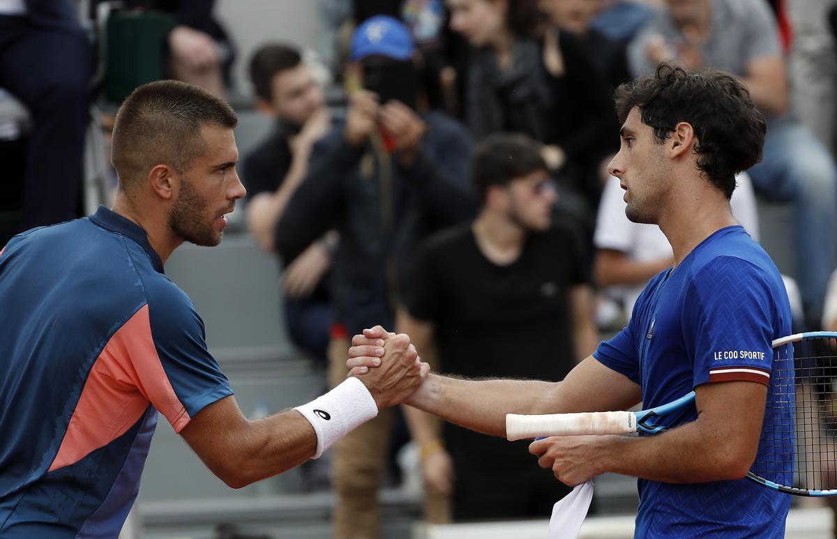 Coric saluda a Taberner al final del partido