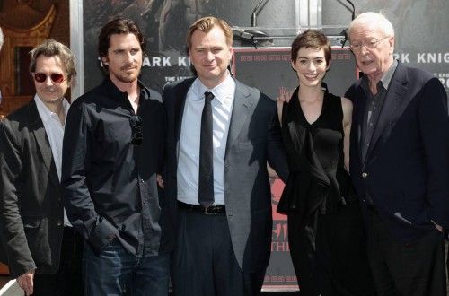 Director Nolan poses with actors Oldman, Bale, Hathaway and Caine, at his hand and footprint ceremony in Hollywood