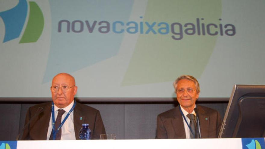 Los copresidentes de Novacaixagalicia Mauro Varela y Julio Fernández Gayoso.