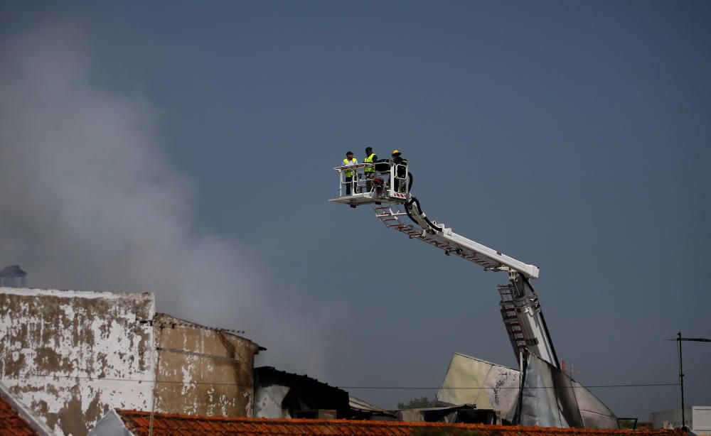 Smoke is seen where a small airplane crashed ...