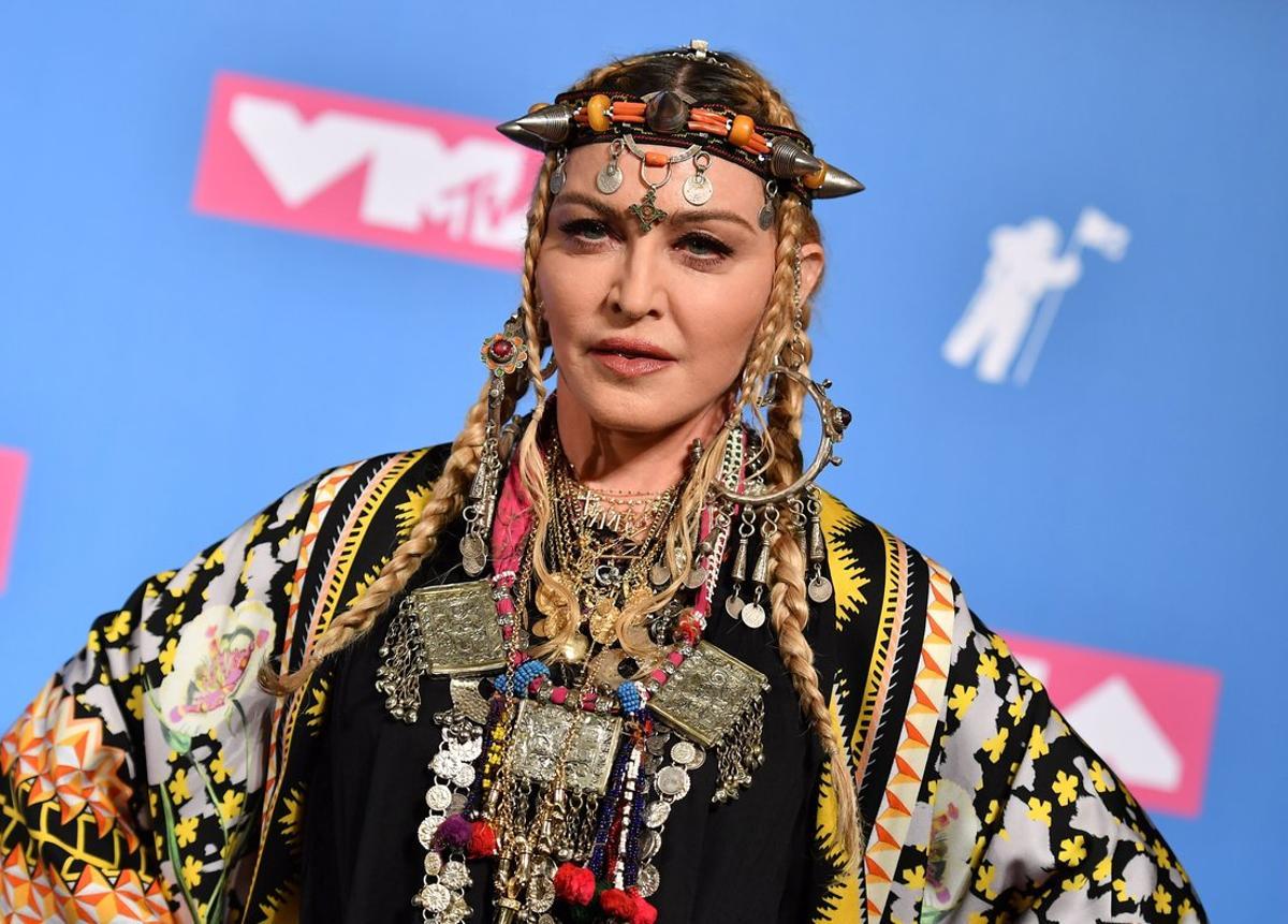 (FILES) In this file photo taken on August 20, 2018 Madonna poses in the press room at the 2018 MTV Video Music Awards at Radio City Music Hall in New York City. - Madonna has revealed that her next project will be the movie of her life -- and the final product should meet with her approval as she is bringing it to the screen herself.