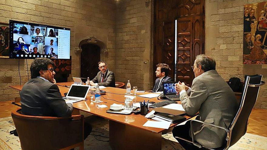 Torra i Aragonès en una reunió amb el grup de treball.