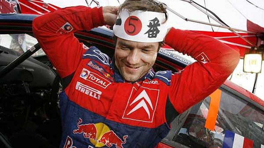 Loeb festeja su título tras la prueba de Japón.