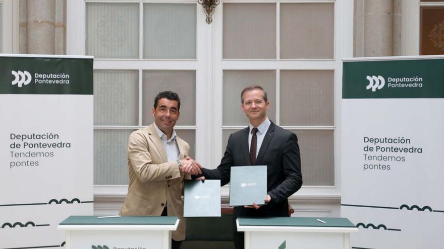 Luis López y Ricardo Durán, en la firma del convenio.