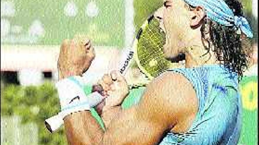 Rafa Nadal celebra su victoria ante Ferrer en Montecarlo.